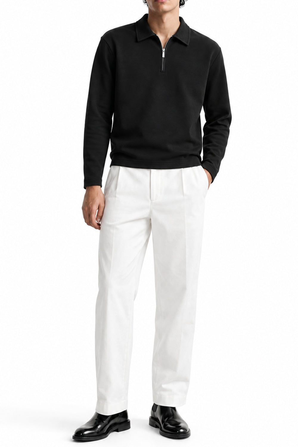 Man wearing the Airloop Black Zipper Polo with white trousers, front view