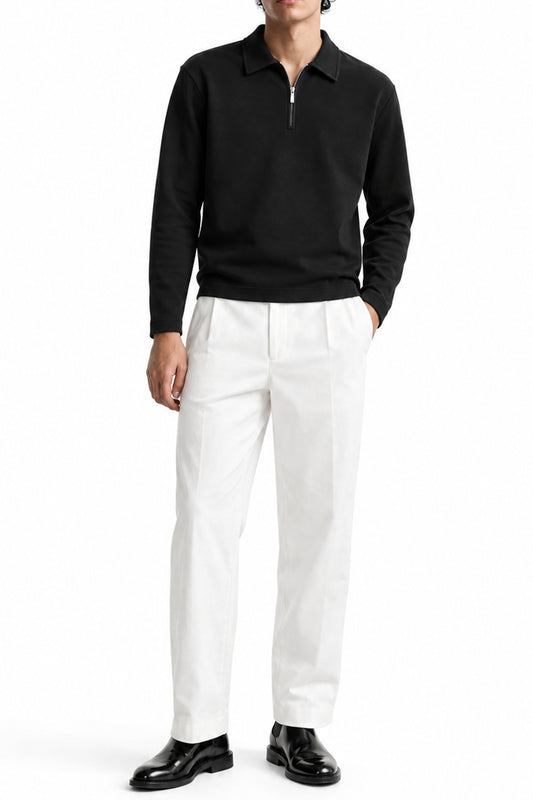 Man wearing the Airloop Black Zipper Polo with white trousers, front view