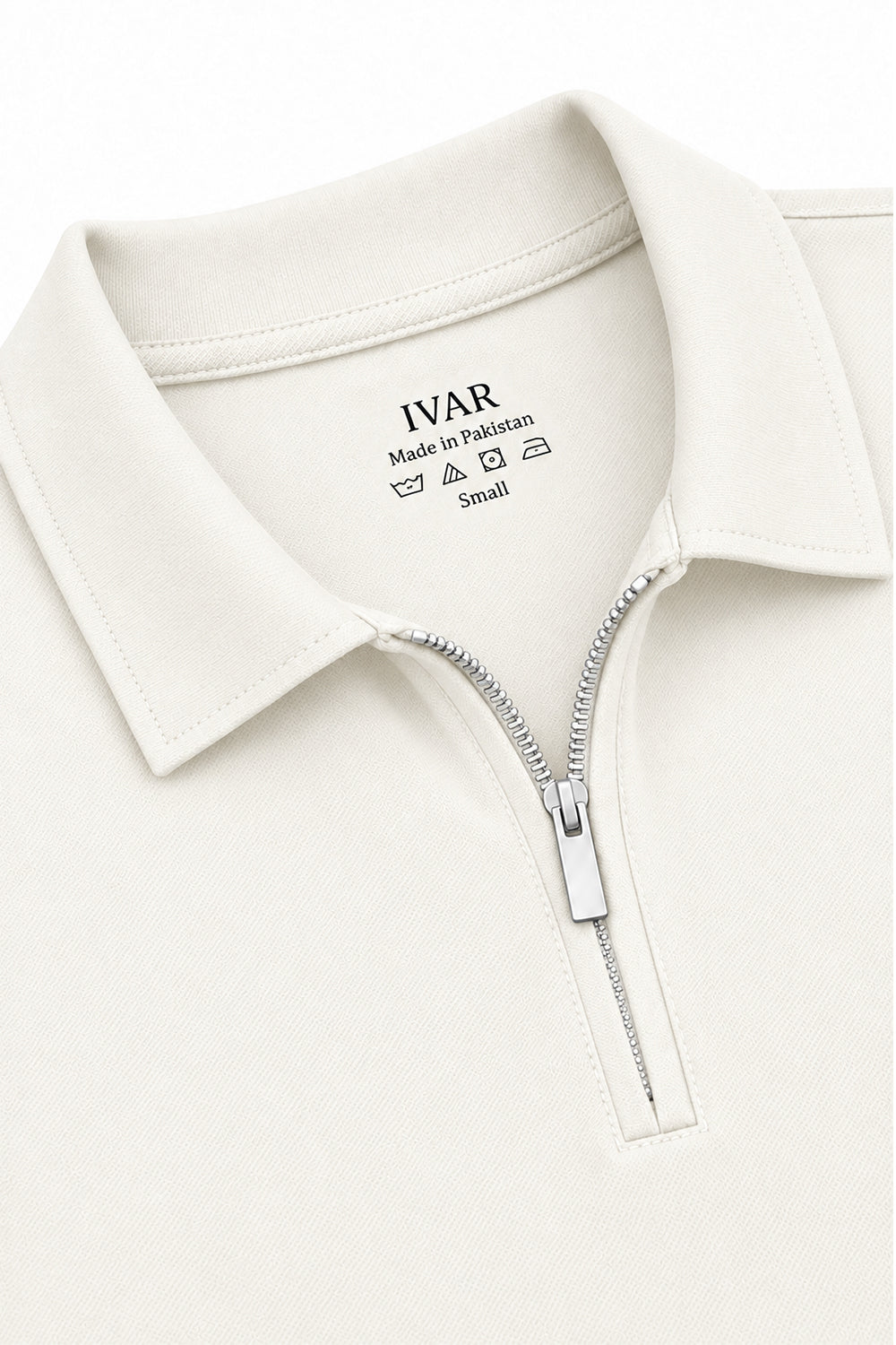 Close-up of Airloop White Zipper Polo collar and quarter-zip detail