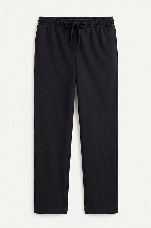 Flat-lay of black tapered fit Pants with elastic drawstring waistband
