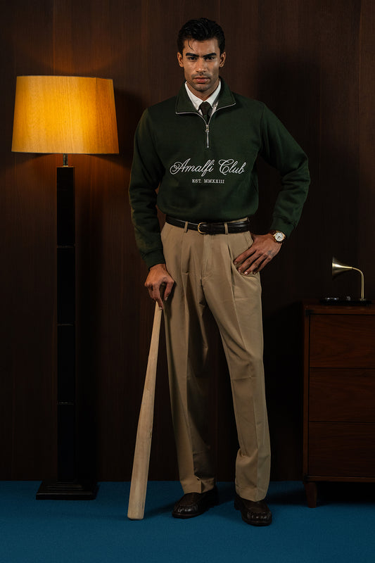 Man wearing the Deep Forest Amalfi Quarter Zipper with khaki trousers, full-length view