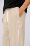 IVAR Beige Arc Track Pants - Close-Up Piping Detail - IVAR Clothing
