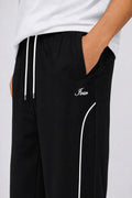 IVAR Black Arc Track Pants - Close-Up Piping Detail - IVAR Clothing