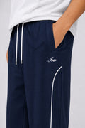 IVAR Navy Arc Track Pants - Close-Up Piping Detail - IVAR Clothing