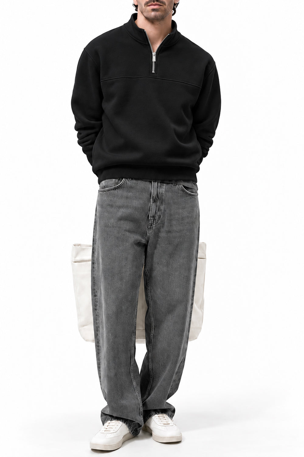 Man wearing the Black Classic Fleece Quarter Zipper with grey joggers