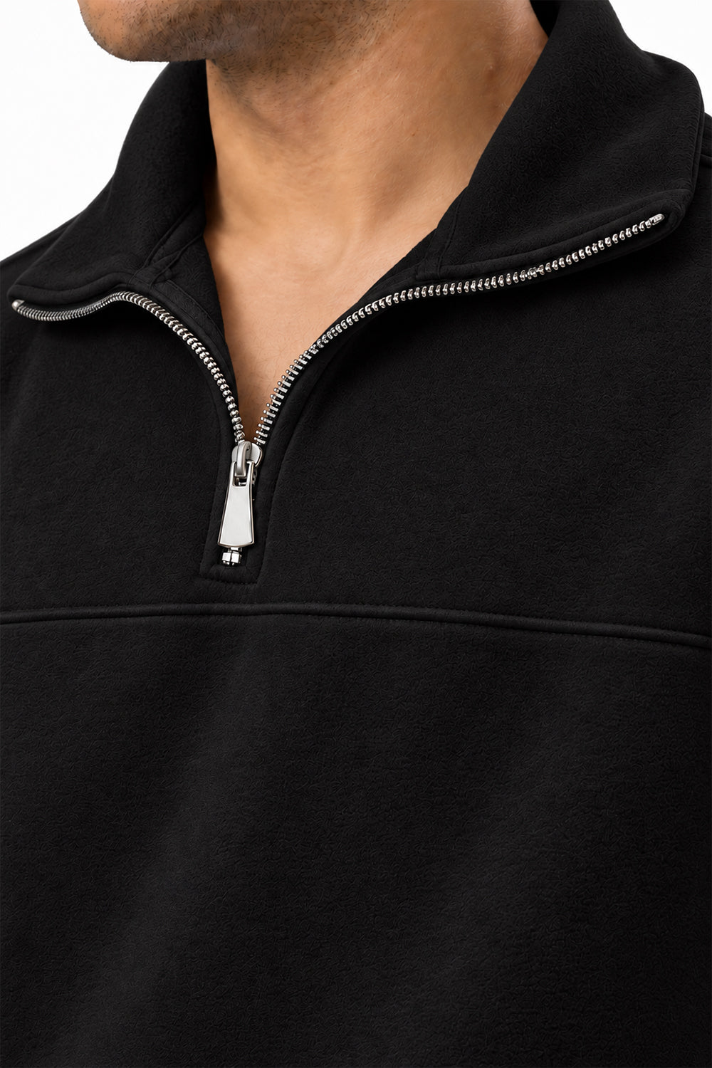 Close-up of Black Classic Fleece Quarter Zipper collar and zip detail