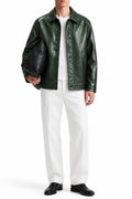 Man wearing the Deep Forest Coat Leather Jacket with white trousers, front view