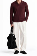 Man wearing the Maroon Dropneedle Full Sleeve Polo with cream trousers