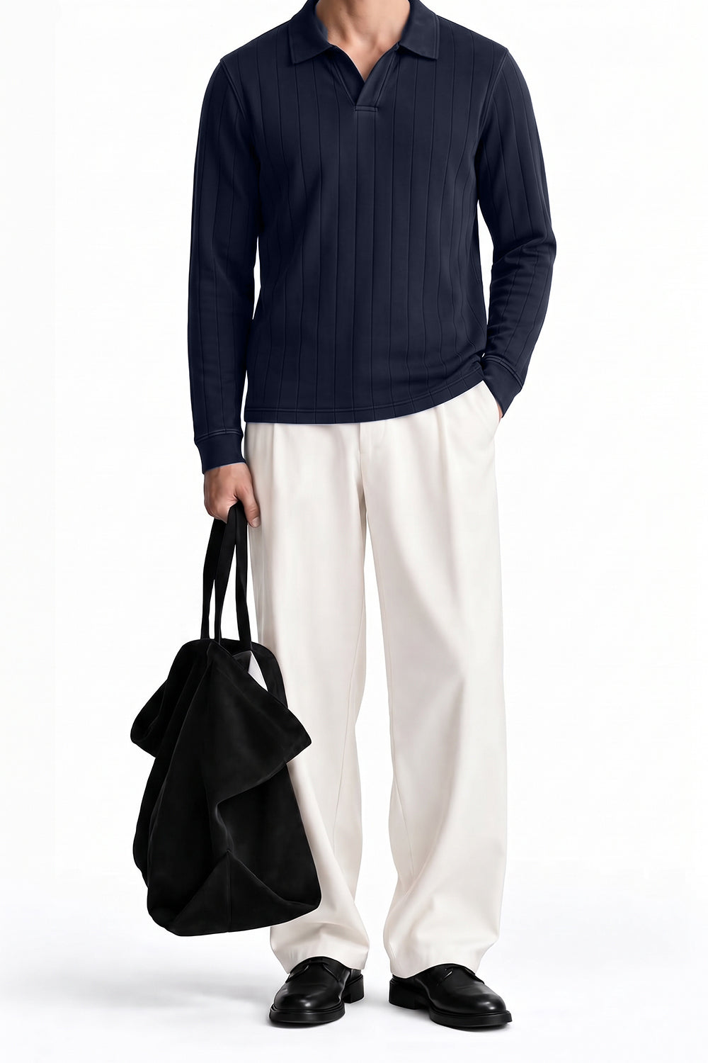 Man wearing the Navy Dropneedle Full Sleeve Polo with cream trousers