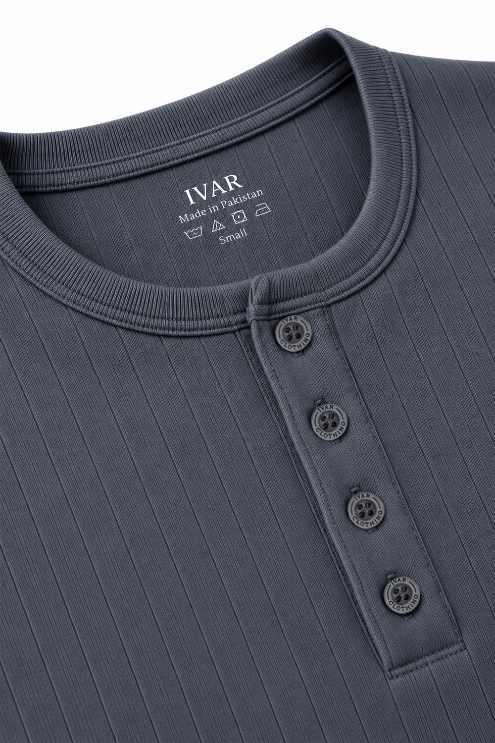 Close-up of grey dropneedle full sleeve henley neckline and button placket
