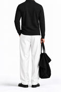 Man wearing the Black Fleece Polo, back view