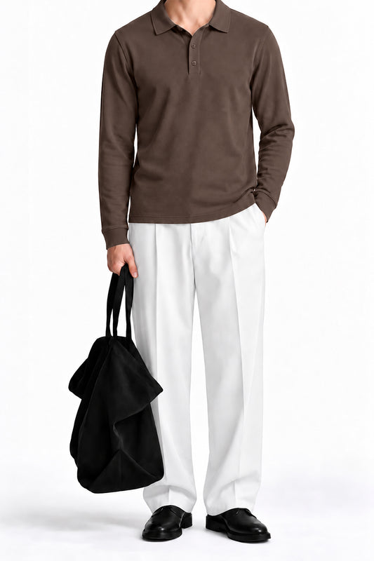 Man wearing the Brown Fleece Polo with white trousers, front view