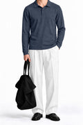 Man wearing the Charcoal Fleece Polo with white trousers, front view