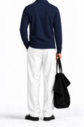 Man wearing the Navy Fleece Polo, back view