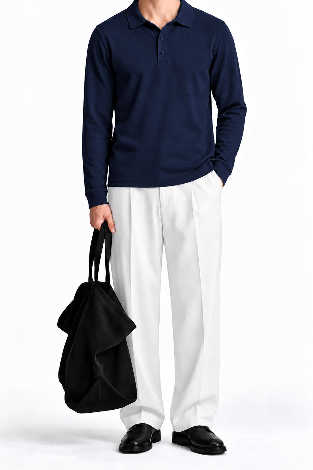 Man wearing the Navy Fleece Polo with white trousers, front view