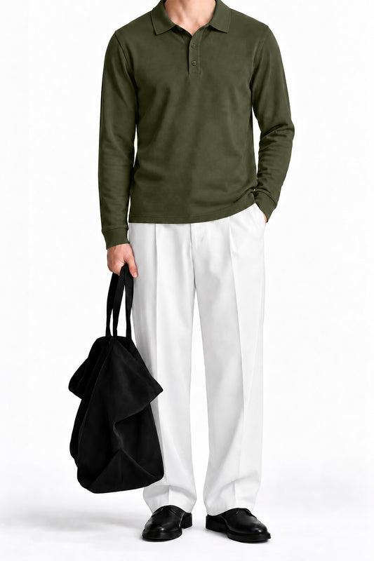Man wearing the Olive Fleece Polo with white trousers, front view