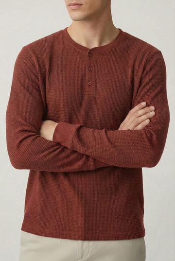 Man wearing rust orange Waffle Knit Full Sleeve Henley with beige pants