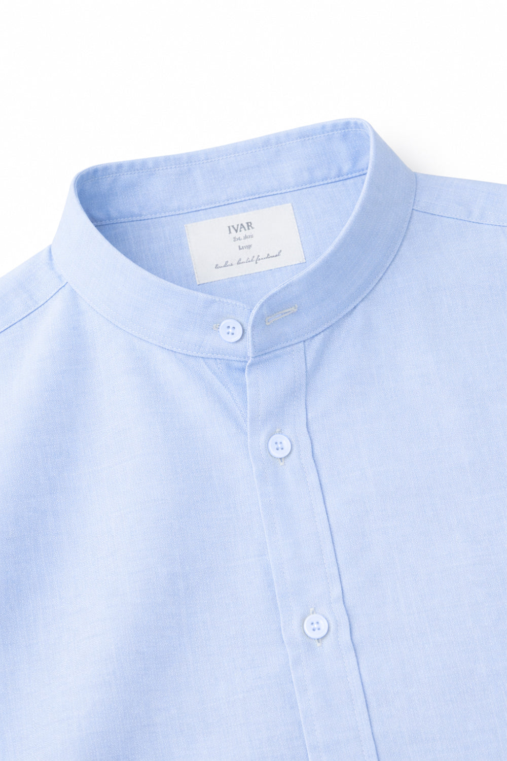Close-up of sky blue Collar Linen Shirt showing band collar and button placket detail