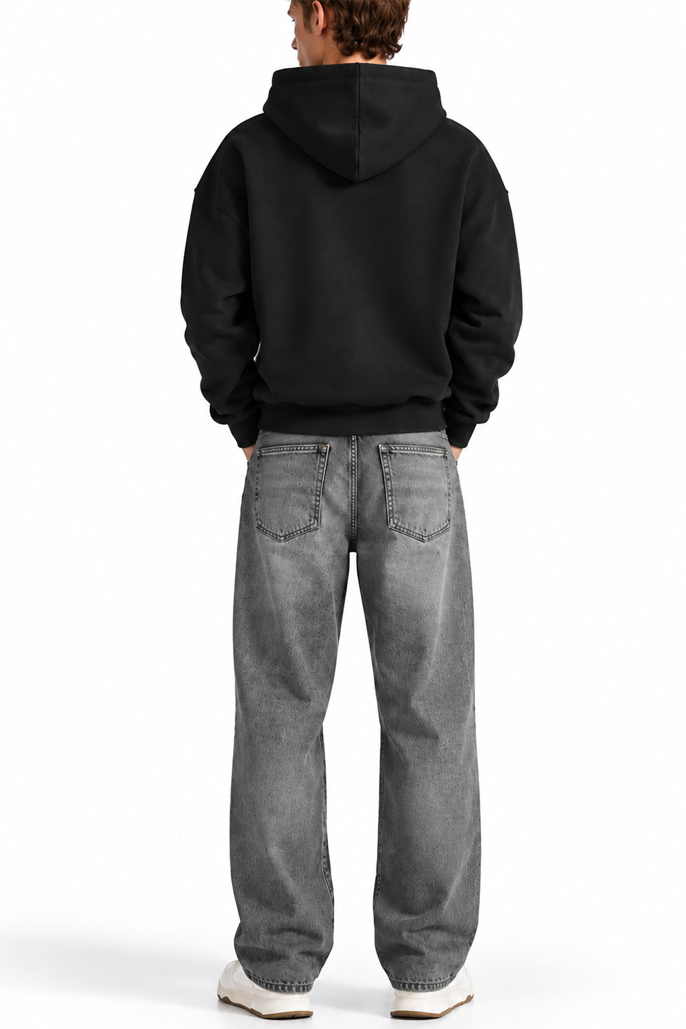 Man wearing the Black NYC Hoodie with grey jeans, back view