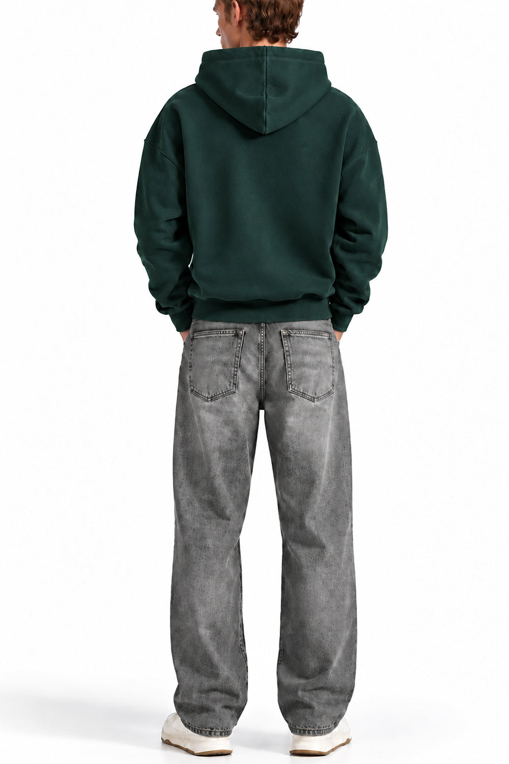 Man wearing the Deep Forest NYC Hoodie with grey jeans, back view
