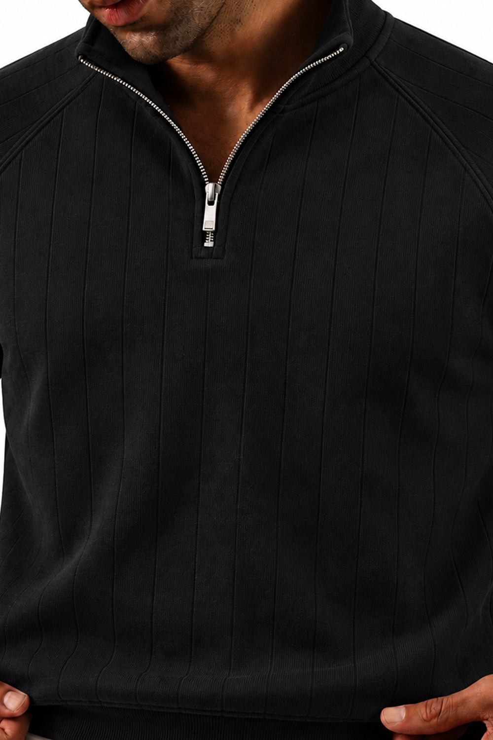 Close-up of Black Raglan Drop Needle Quarter Zipper texture and zip detail