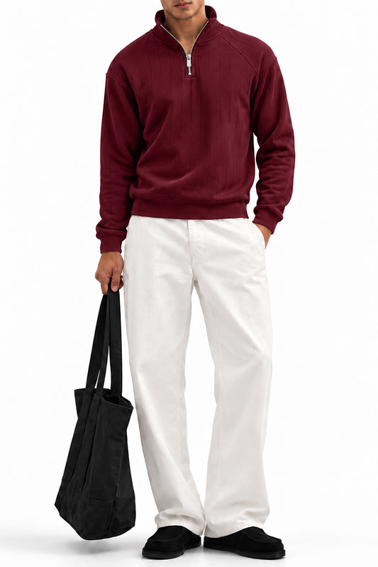 Man wearing the Maroon Raglan Drop Needle Quarter Zipper with white trousers, front view