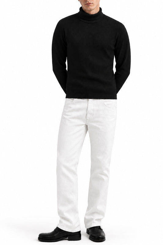 Man wearing the Black Ribbed Highneck with white trousers