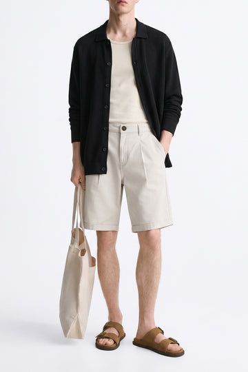 IVAR Light Beige Tailored Pleated Shorts - Model Wearing, Front View - IVAR Clothing