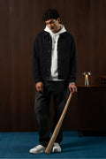 Man wearing the Black Timeless Denim Jacket, front view