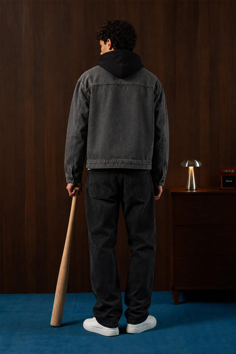 Man wearing the Grey Timeless Denim Jacket, side view