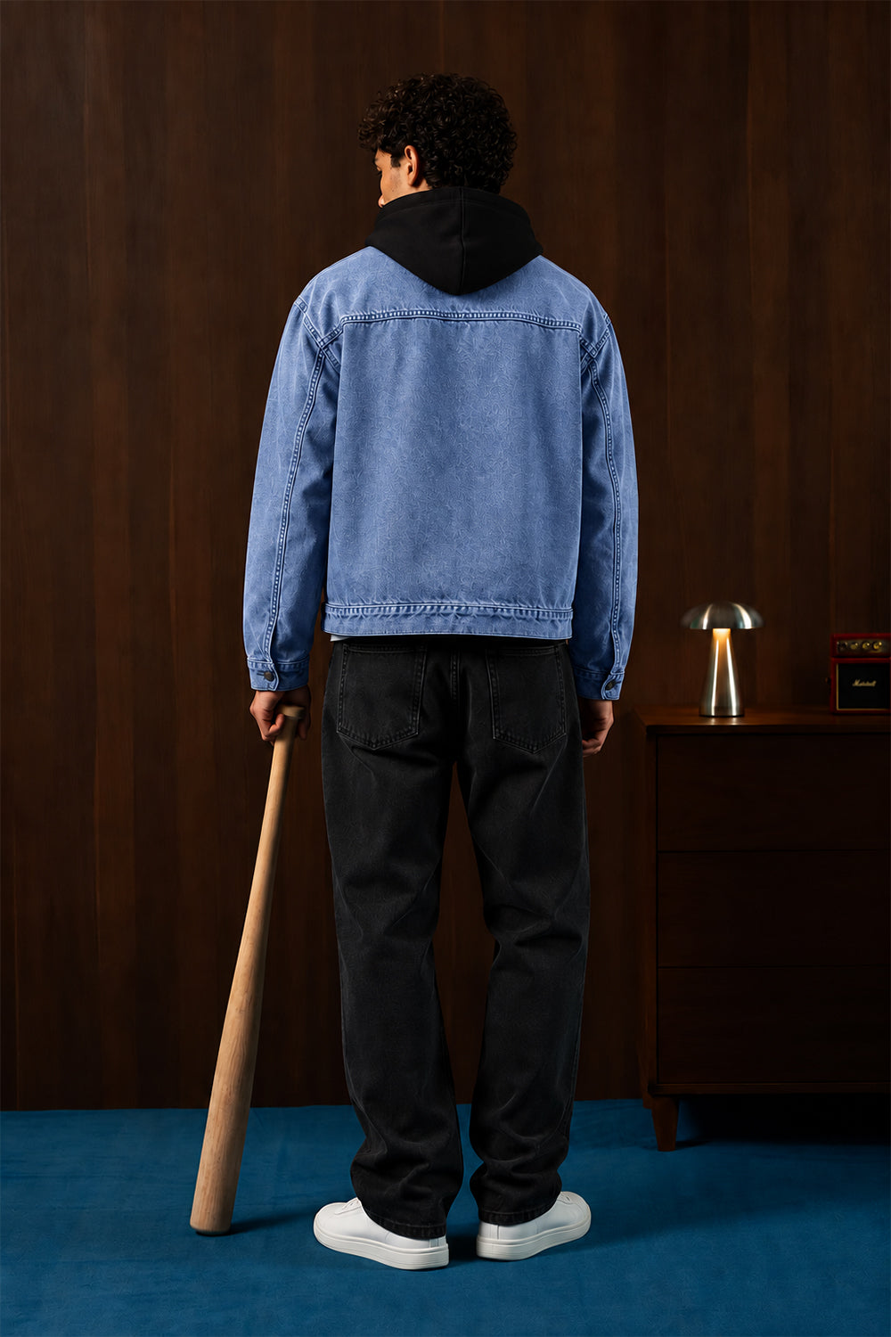 Man wearing the Washed Blue Timeless Denim Jacket, back view