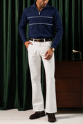 Man wearing the Navy Yacht Fleece Quarter Zipper with white trousers, front view